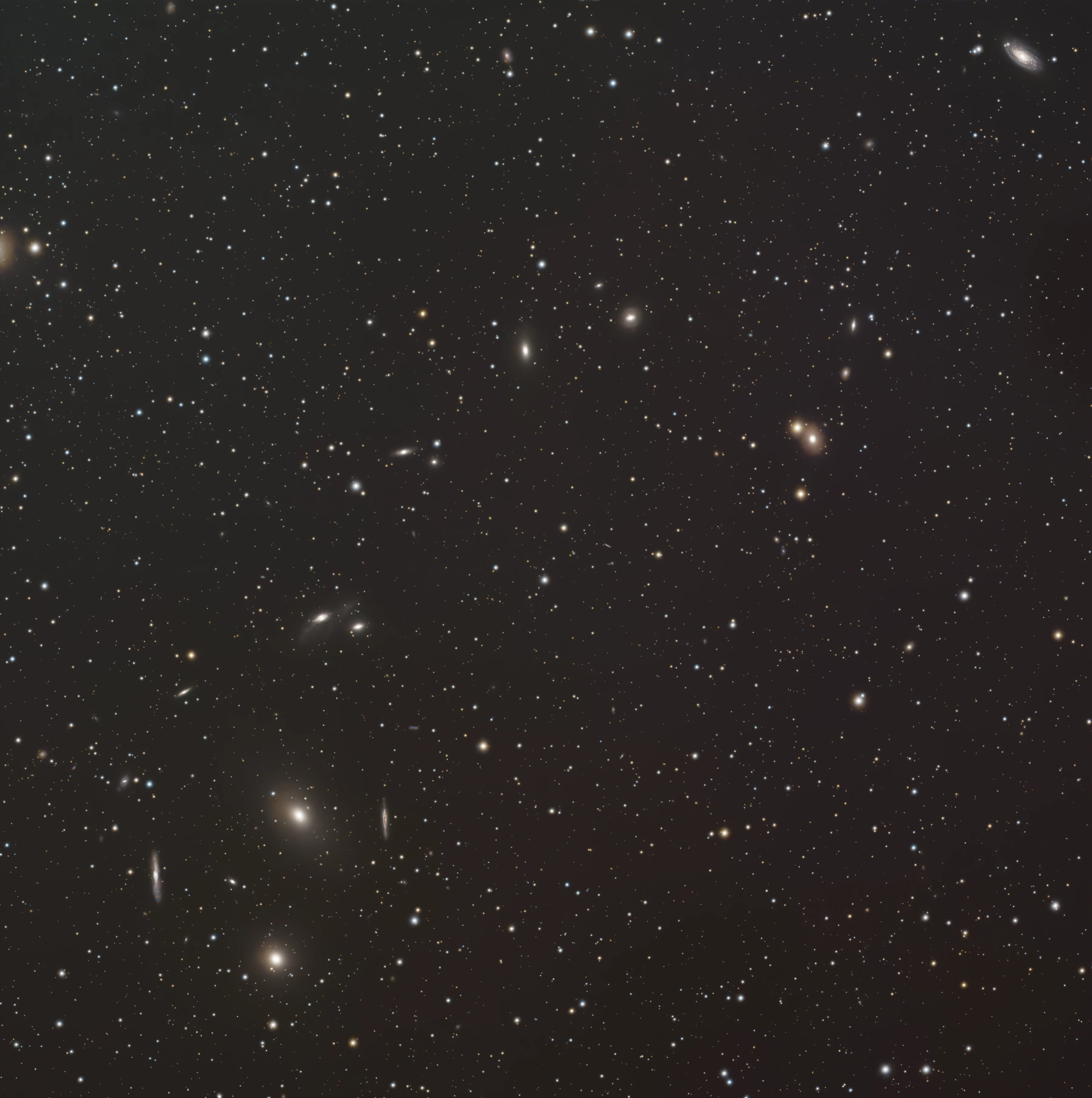 Astrophotograph of Markarian’s Chain by Sam Guber.
